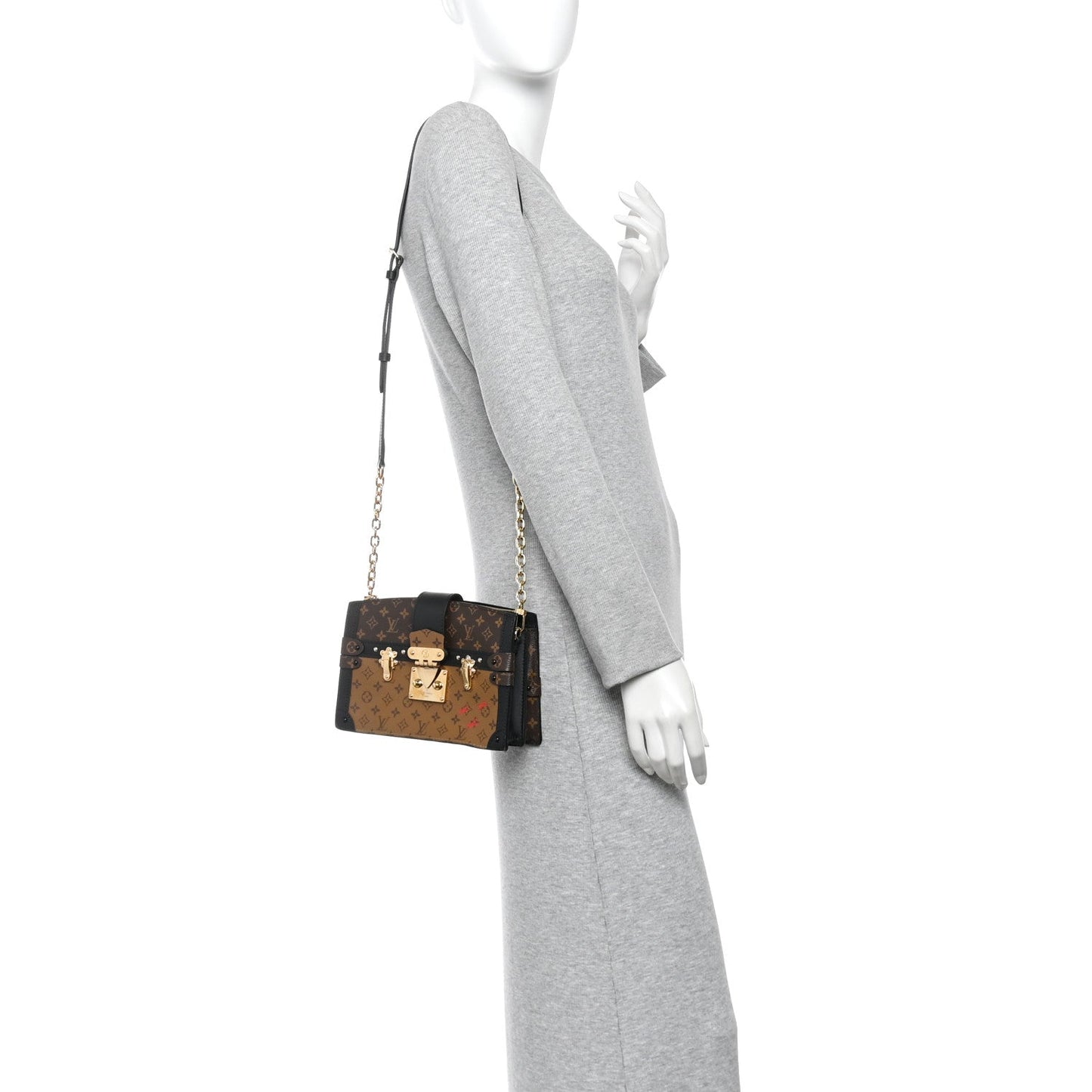Reverse Monogram Trunk Clutch