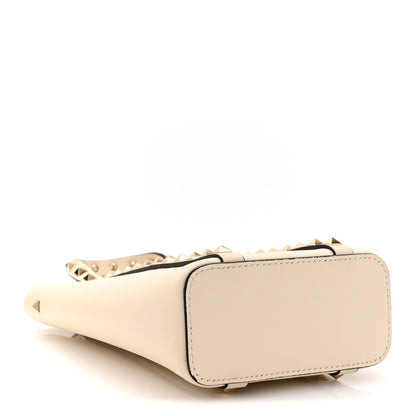 Pebbled Calfskin Rockstud North South Crossbody Bag Light Ivory
