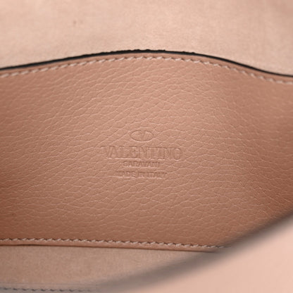 Pebbled Calfskin Medium Rockstud Flip Lock Crossbody Bag Poudre