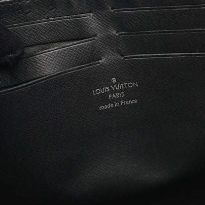 Louis Vuitton Pochette Voyage Taiga Clutch Bag