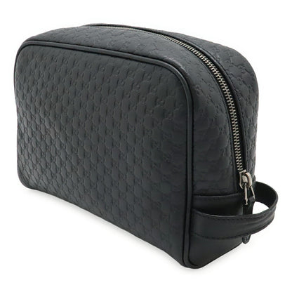 Gucci Microguccissima Leather Clutch Bag