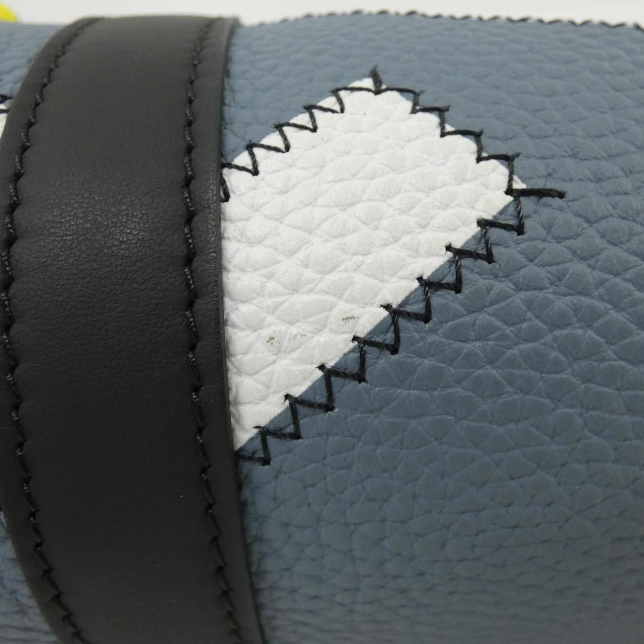 Louis Vuitton Day Break Polochon Calf Shoulder Bag