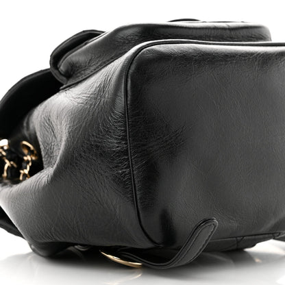 Glazed Aged Calfskin Quilted Small Duma Drawstring Backpack Black