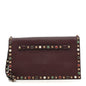 Pebbled Calfskin Rockstud Rolling Wristlet Clutch  Rubin