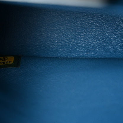 Iridescent Caviar Quilted Medium Double Flap Blue