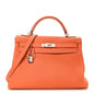Togo Kelly Retourne 32 Orange
