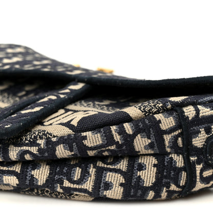 Oblique Embroidered Saddle Bag Blue