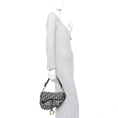Oblique Embroidered Saddle Bag Blue