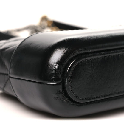 Aged Calfskin Quilted Small Gabrielle Clutch With Chain Black