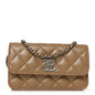 Iridescent Caviar Quilted Camellia Phone Holder With Chain Beige