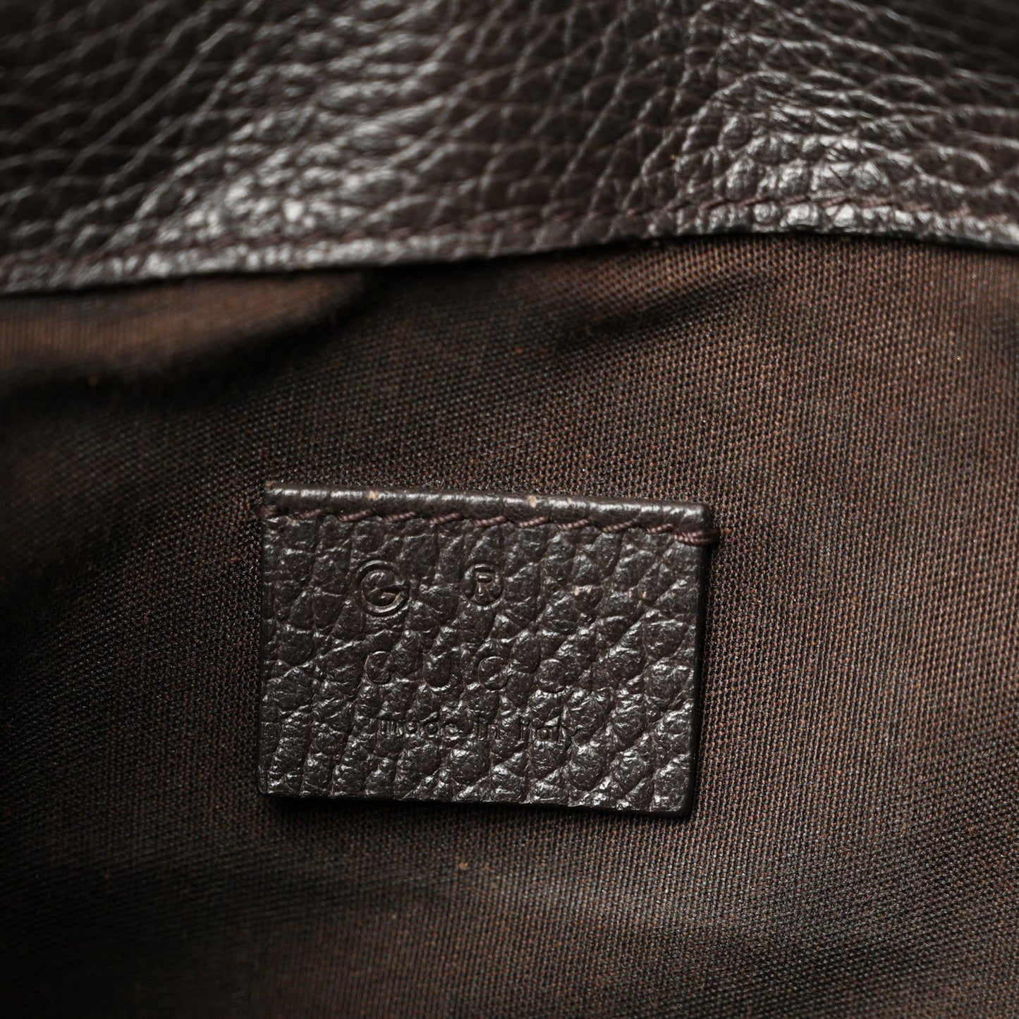 Monogram Dollar Calfskin O Drawstring Backpack Beige Ebony Testa di Moro Dark Chocolate
