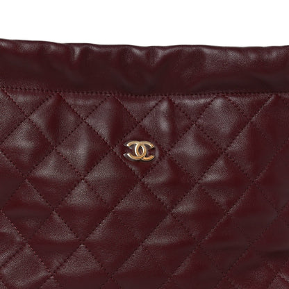Lambskin Quilted Drawstring Clutch With Strap Dark Burgundy