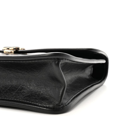 Aged Calfskin Charms Flap Bag Black