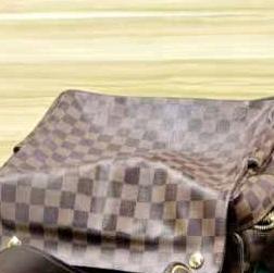 Louis Vuitton Navigilo Monogram Coated Canvas Shoulder Bag