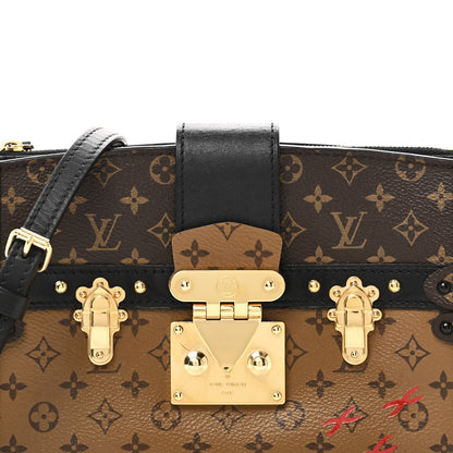 Reverse Monogram Trunk Clutch