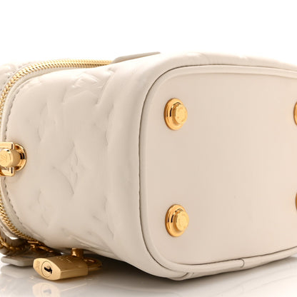 Lambskin Embossed Monogram Coussin Vanity PM  Cream