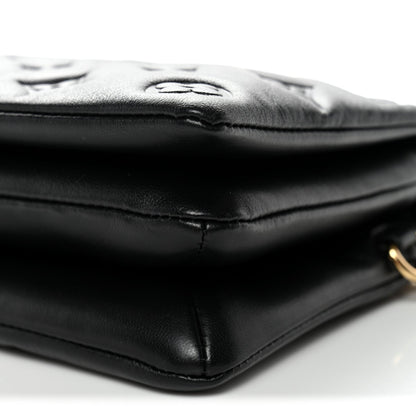 Lambskin Embossed Monogram Pochette Coussin Black