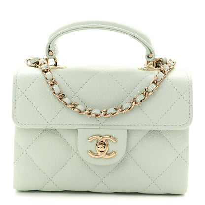 Caviar Quilted Retro Twist Top Handle Clutch Light Green