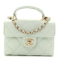Caviar Quilted Retro Twist Top Handle Clutch Light Green