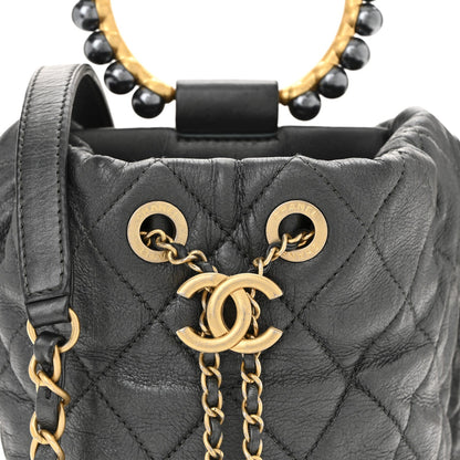 Metallic Lambskin Quilted Pearl Crown Drawstring Bag Anthracite