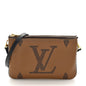 Reverse Monogram Giant Double Zip Pochette