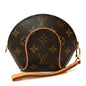 Monogram Mini Ellipse Wristlet Clutch