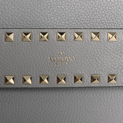 Pebble Calfskin Rockstud Side Slip Wristlet Clutch Pastel Grey