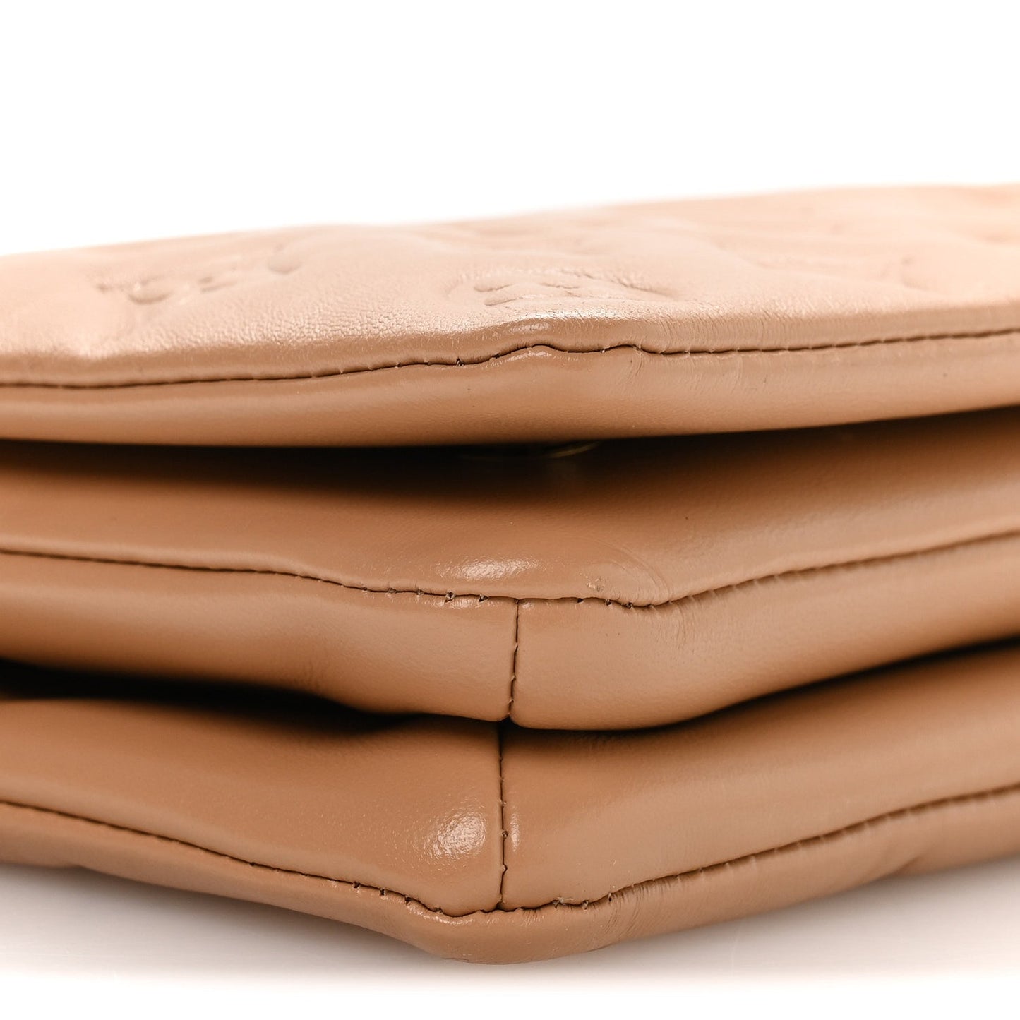 Lambskin Embossed Monogram Pochette Coussin Camel