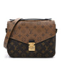 Reverse Monogram Pochette Metis