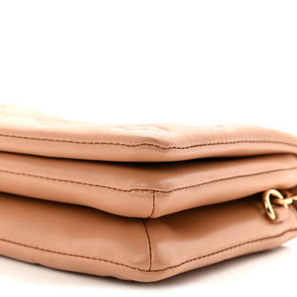 Lambskin Embossed Monogram Pochette Coussin Camel