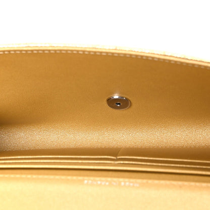 Metallic Caviar Quilted Top Handle Long Clutch With Chain Gold