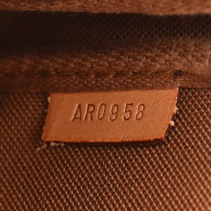 Monogram Pochette Wristlet