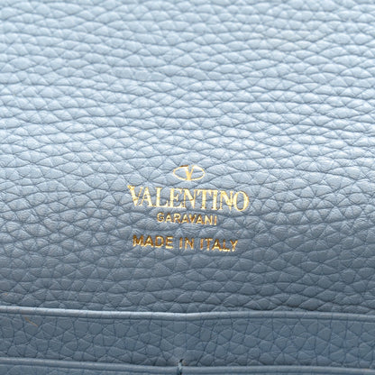 Pebbled Calfskin Rockstud Flip Lock Wallet On Chain Niagara