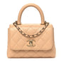 Caviar Quilted Coco Handle Clutch With Chain Beige