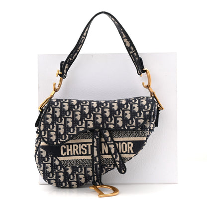 Oblique Embroidered Saddle Bag Blue