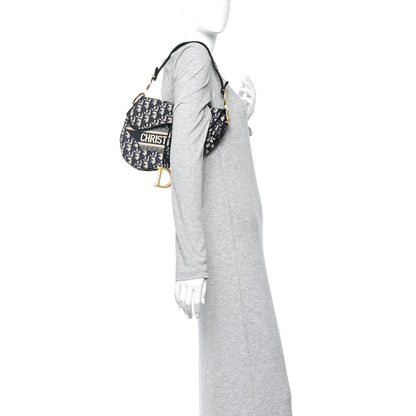 Oblique Embroidered Saddle Bag Blue