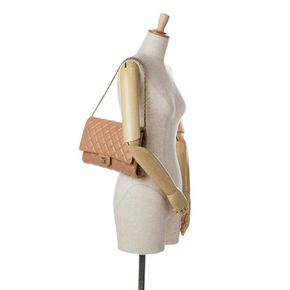 Chanel CC Quilted Lambskin Clutch With Chain (SHG-1pgPyi)