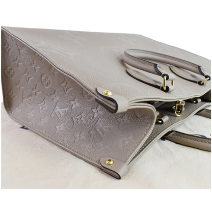 LOUIS VUITTON Onthego MM Monogram Empreinte Shoulder Bag Tourterelle