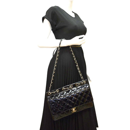 CHANEL Through Flap Quilted Patent Leather Shoulder Bag Black