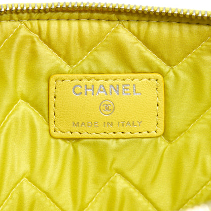 CHANEL CHEVRON CLUTCH BAG IN YELLOW