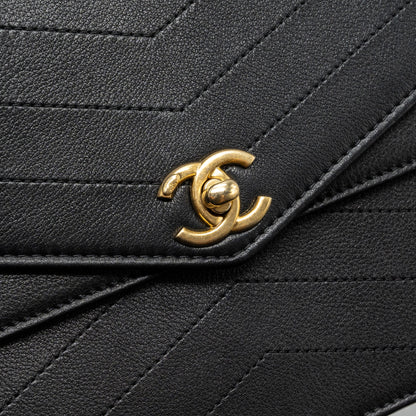 Chanel Voyage Chevron Clutch Calfskin Black
