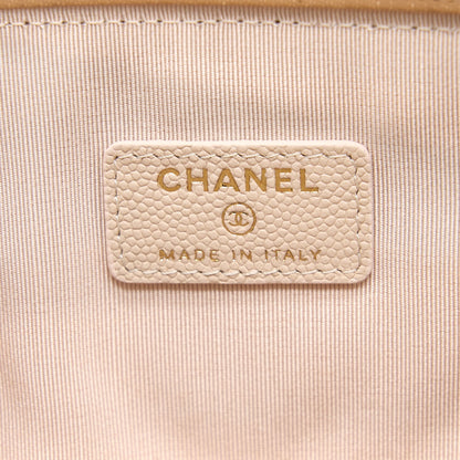 Chanel Clutch Chevron Caviar Beige