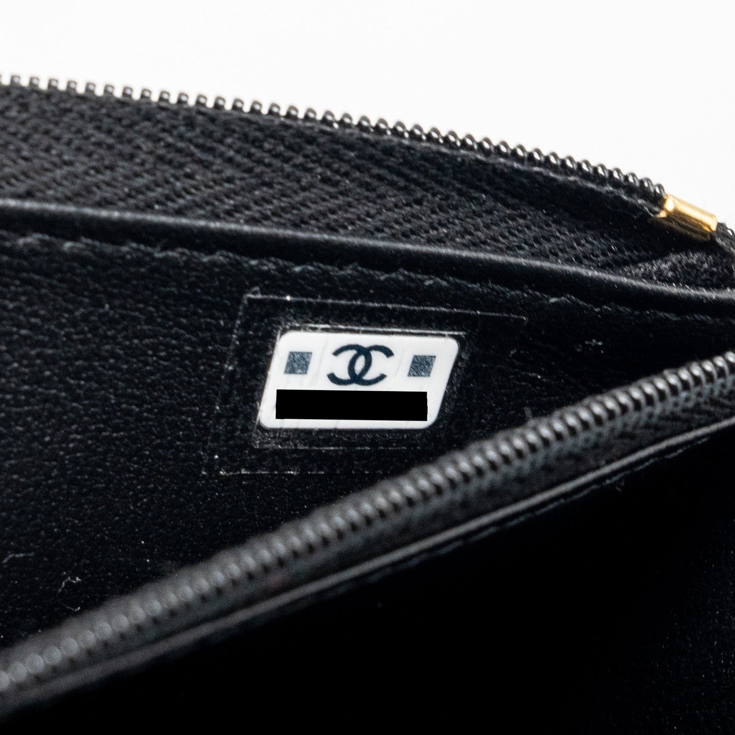 Chanel 23A clutch with chain lambskin black  (microchip)
