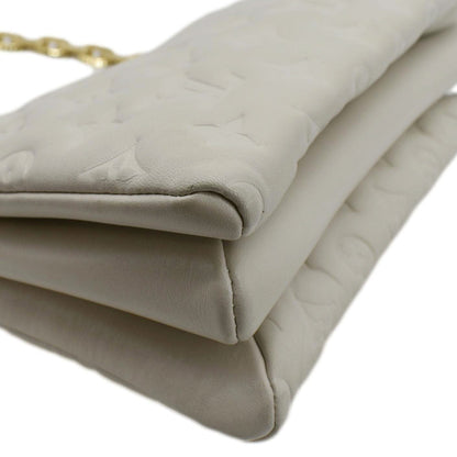 LOUIS VUITTON Coussin PM Monogram Embossed Shoulder Bag Creme