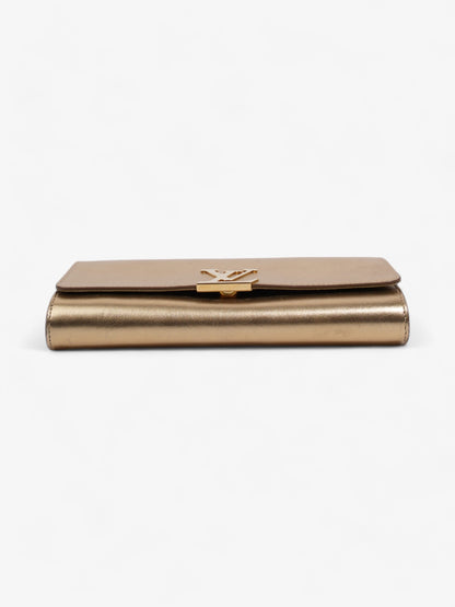 Louis Vuitton Louise Clutch Gold Leather