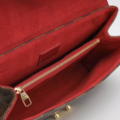 Louis Vuitton Caissa Clutch