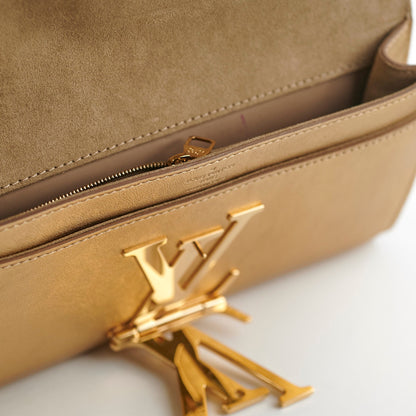 Louis Vuitton Louise Pochette Gold Clutch