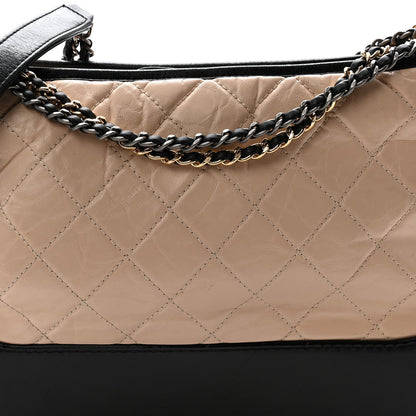 Aged Calfskin Quilted Medium Gabrielle Hobo Beige Black