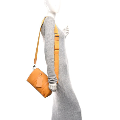 Grained Calfskin Aerogram City Keepall Safran Yellow