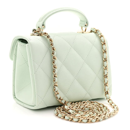 Caviar Quilted Retro Twist Top Handle Clutch Light Green